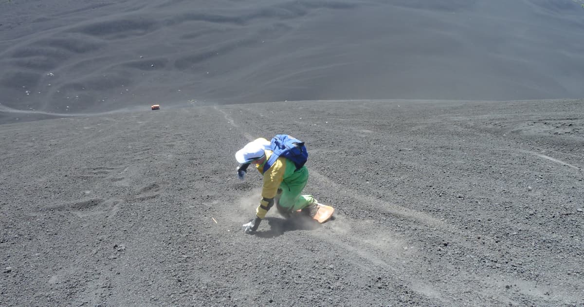 sandboarding down a volcano
