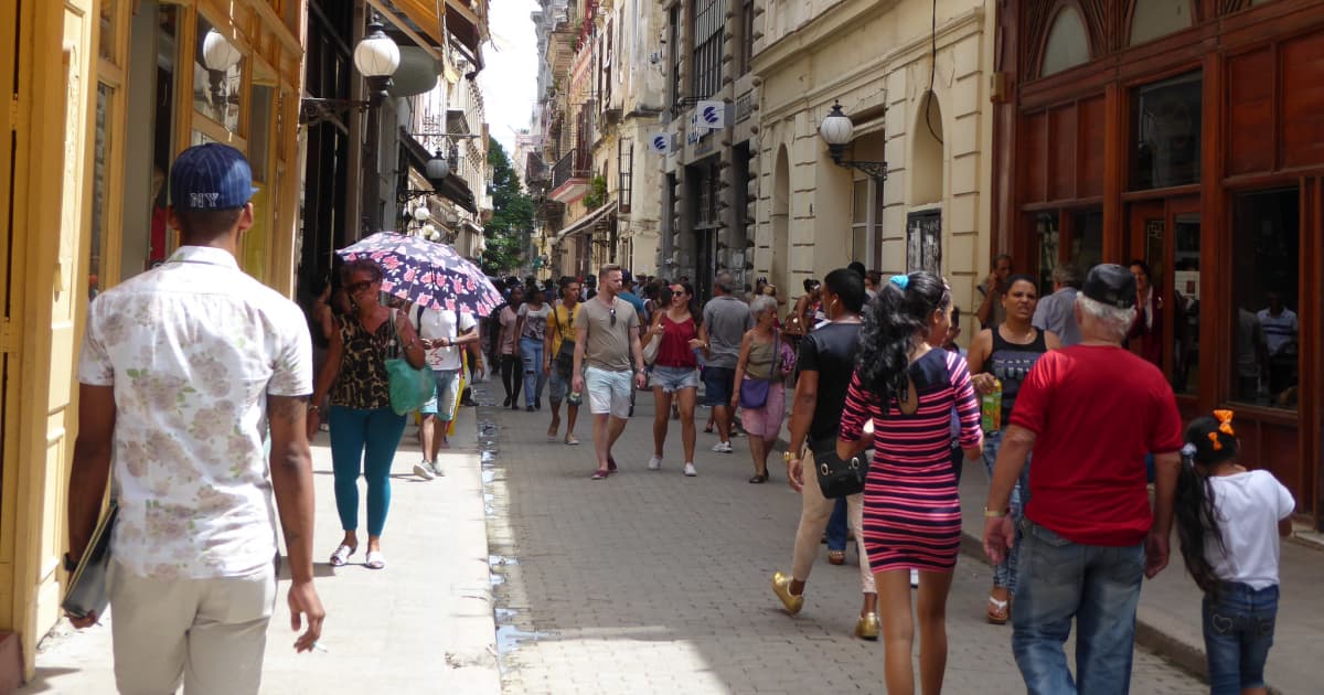 tourists filling a busy side street