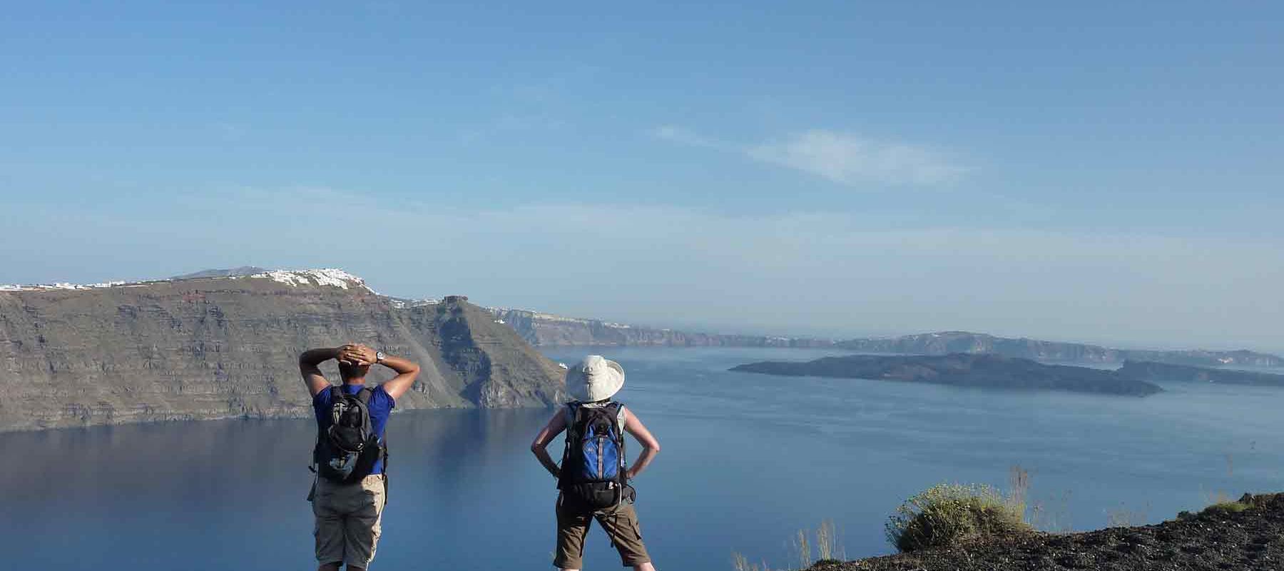 2 BikeHike Travelers overlooking Greek Islands