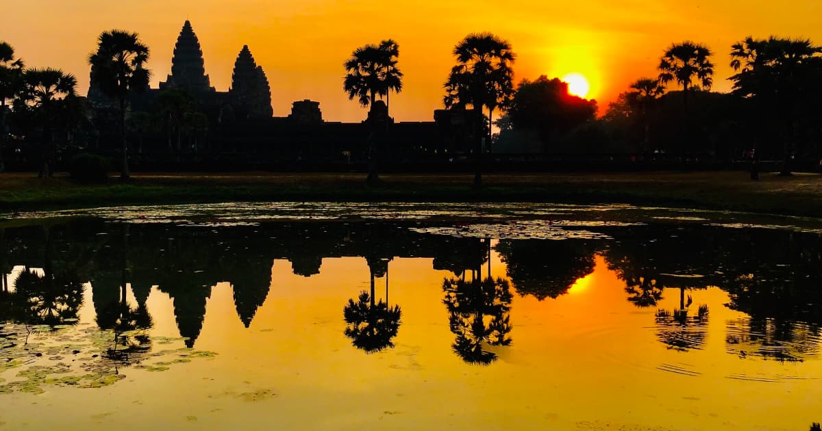 sun rising over Angkor Wat