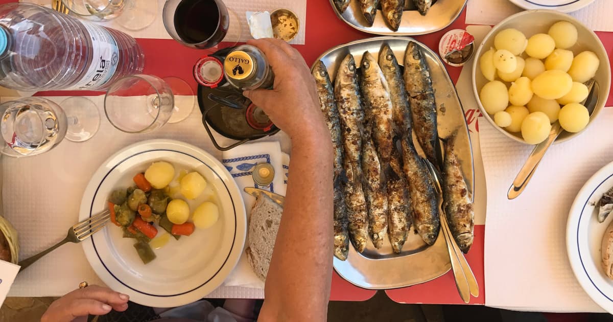 a table with a wide food selection at a restaurant in Porto