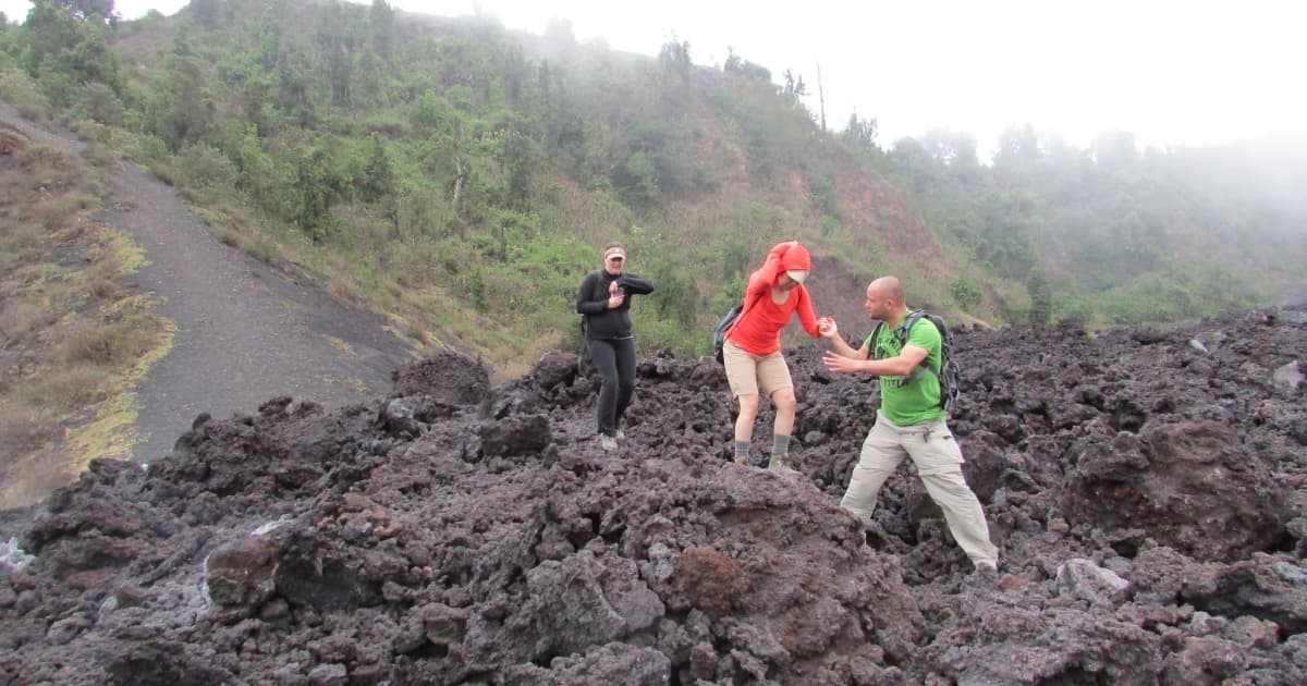 tourists hiking a volcano in Guatemala