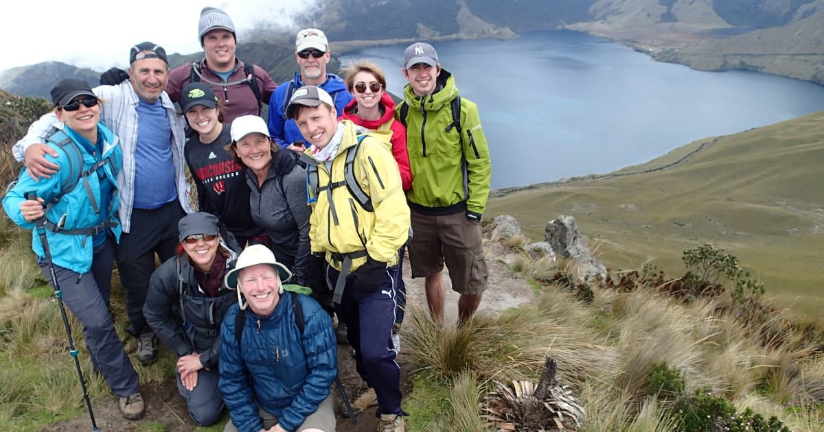 Group of hikers fully layered in wet conditions