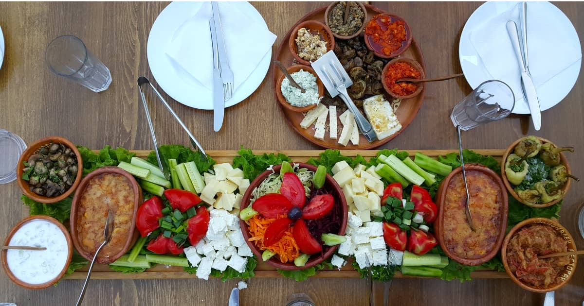 a table full of locally sourced food and ingredients