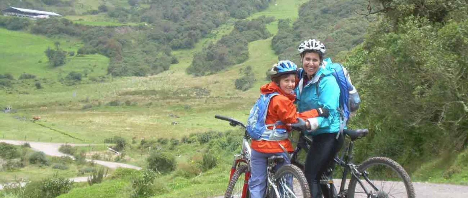 Family biking a mountain