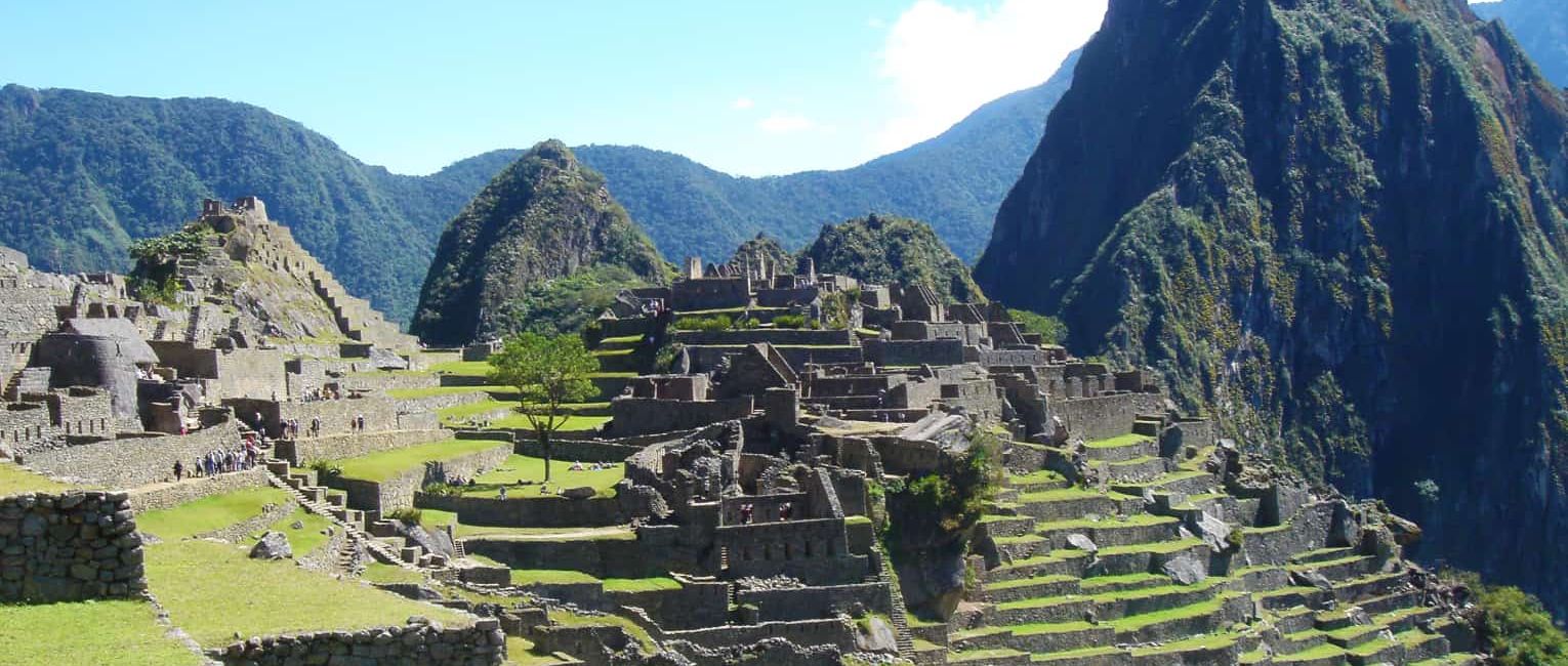 Travelers at the ruins of Machu Picchu