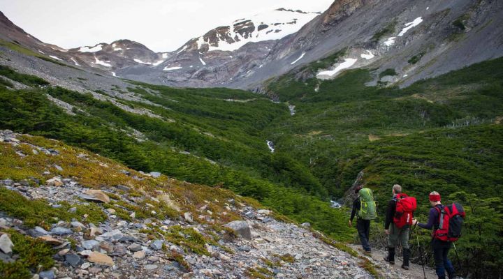 Group hiking through a mountain trail