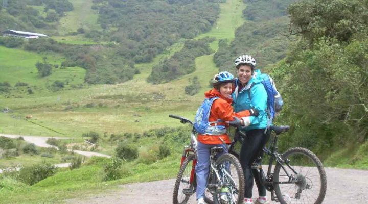 Family biking a mountain