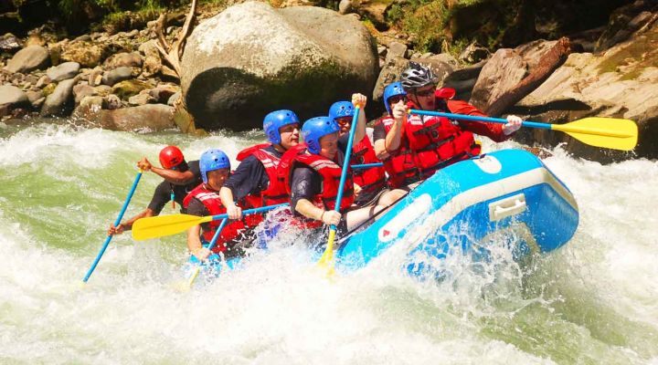 Kayaking Down Rapids