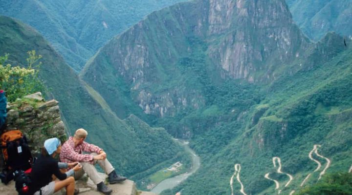 Group hiking on Peru mountain trail