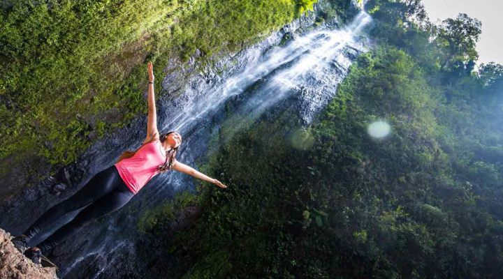 Standing under Nicaragua waterfall