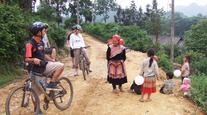 Group cycling through Sapa Mountains