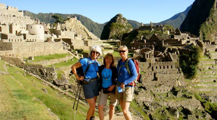 Group of travelers on hiking Trail in Machu Picchu Peru