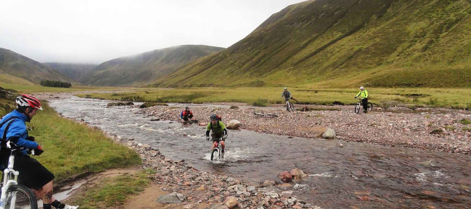 Guided Mountain Biking Through Scotland Lakes