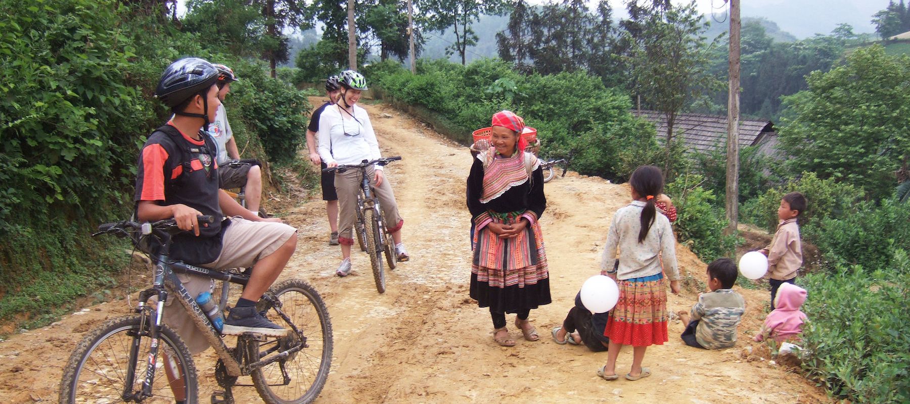 Group cycling through Sapa Mountains