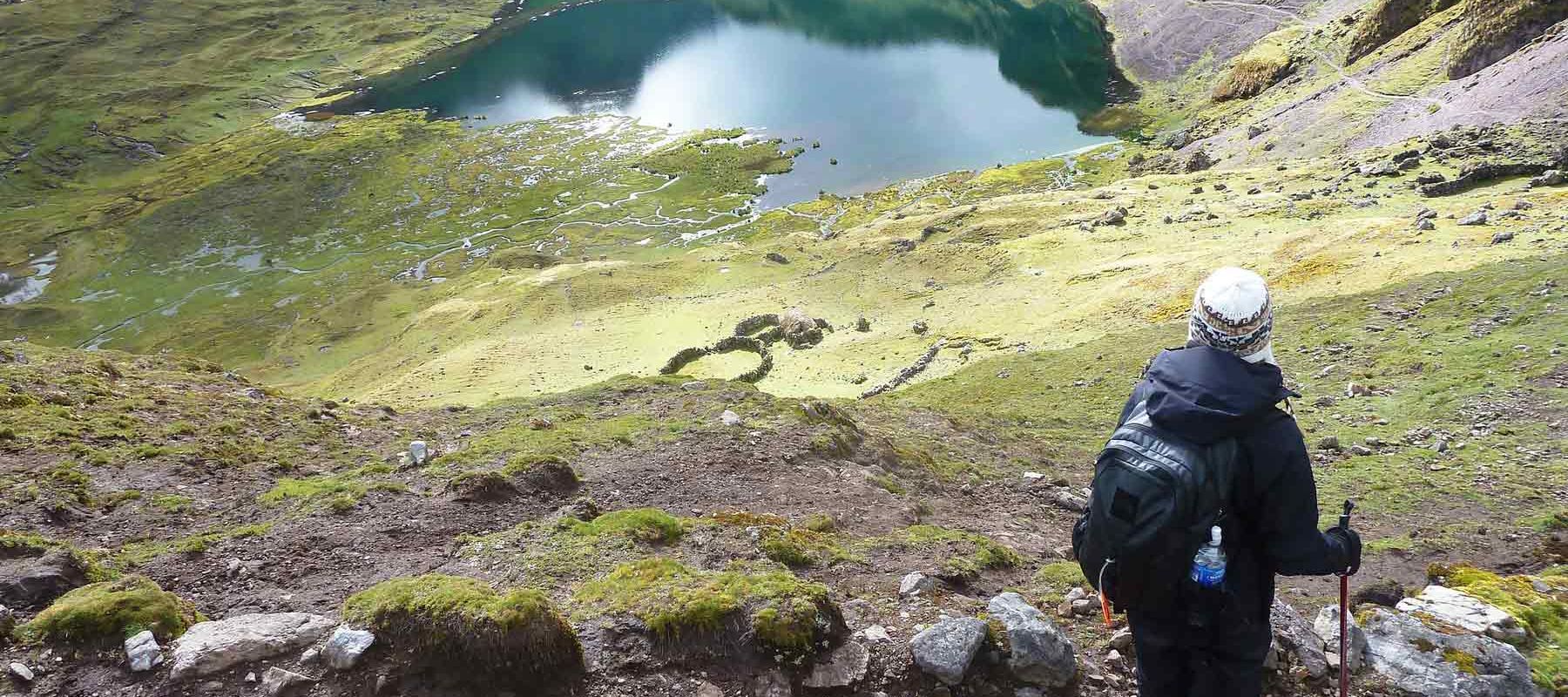 Hiking the dirt path of the Lares Trail Peru