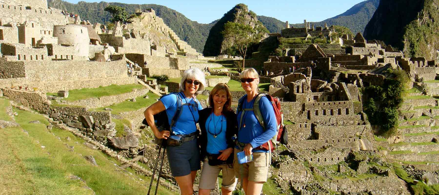 Group of travelers on hiking Trail in Machu Picchu Peru